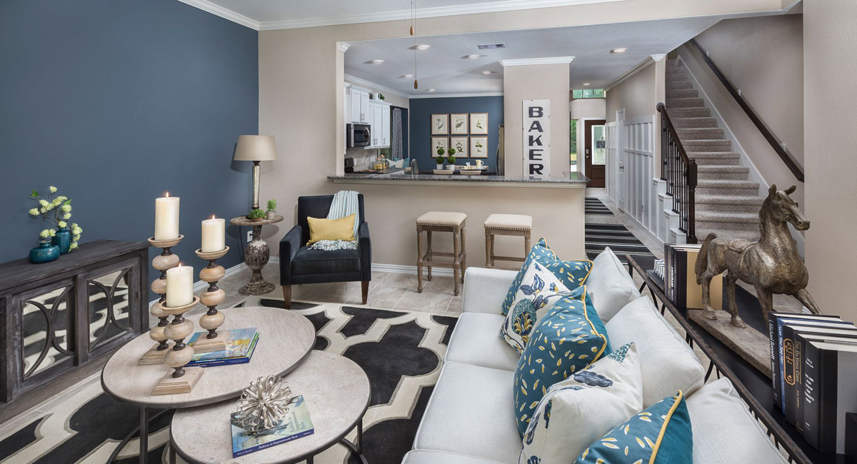 Lennar Houston blue living room and kitchen