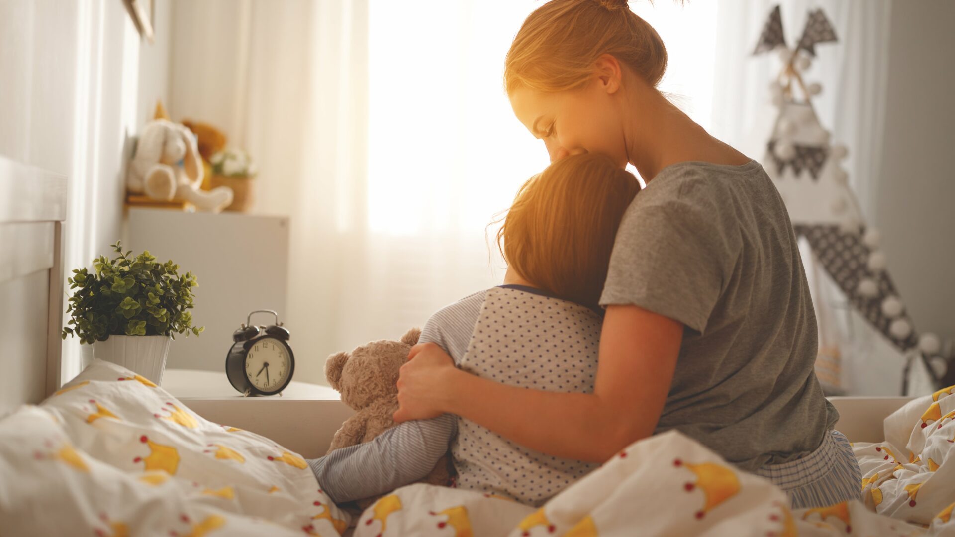 Family Mom and Child Hugging