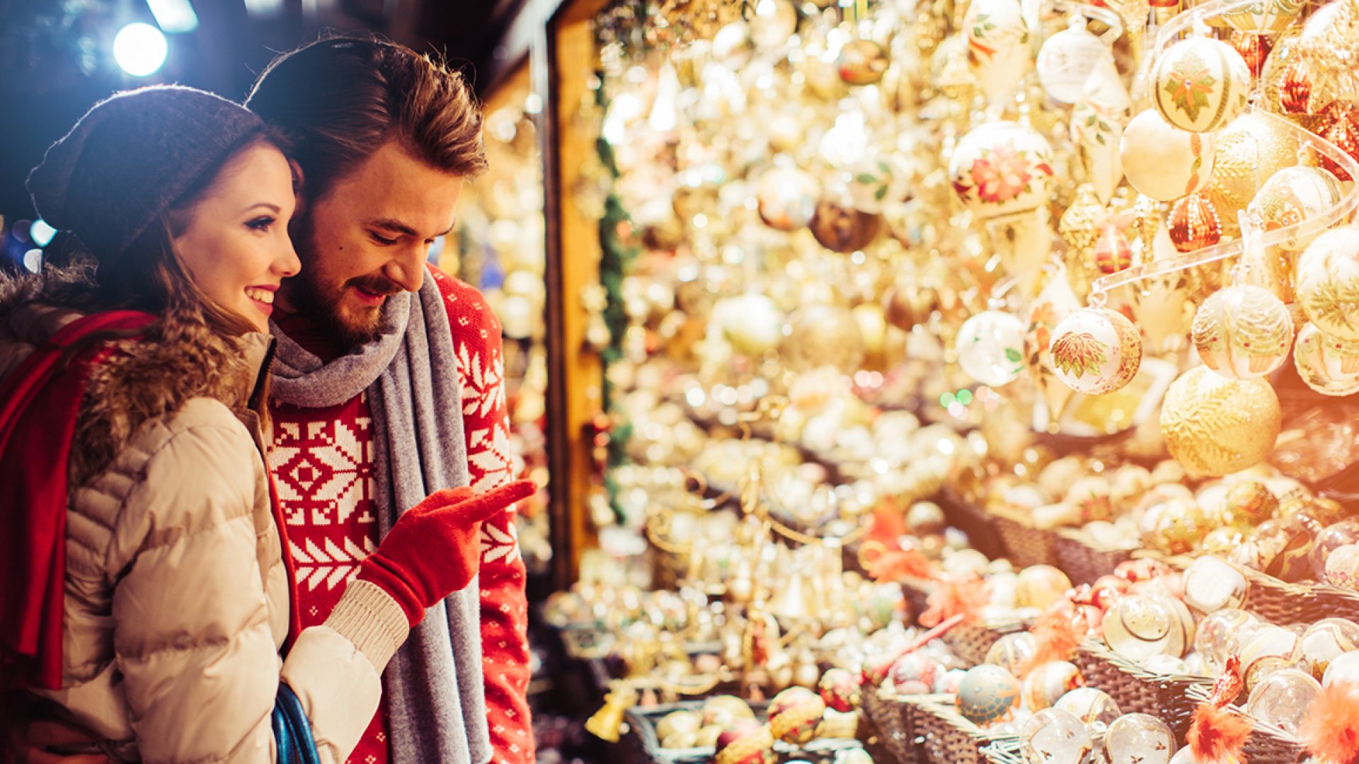 Couple shopping at Christmas fair