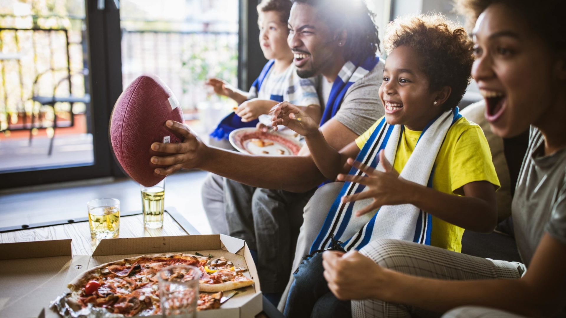 Family Watching Football