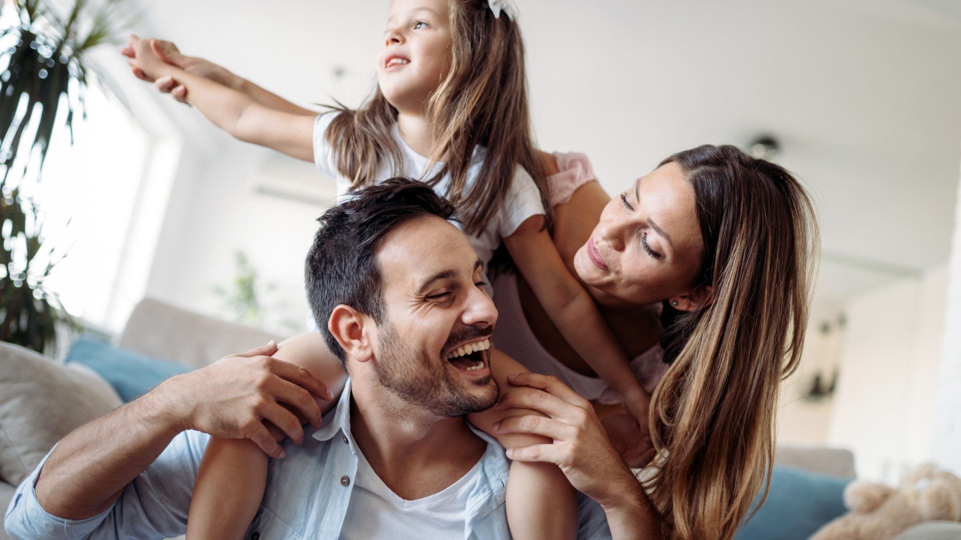 Happy family having fun time together at home