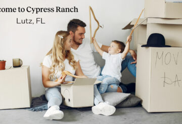 family unpacking boxes Welcome to Cypress Ranch - Lutz FL