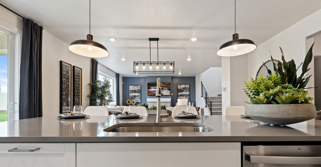 Lennar home with open kitchen and succulent bowl