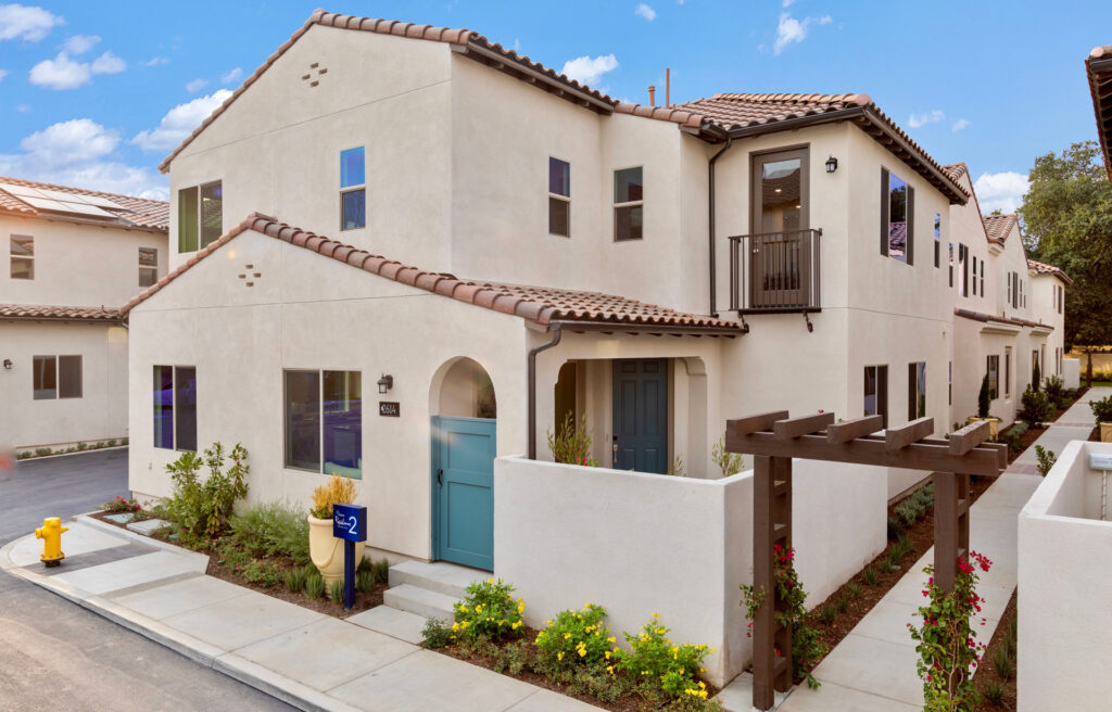 Lennar home with flowers and landscaping in the front 