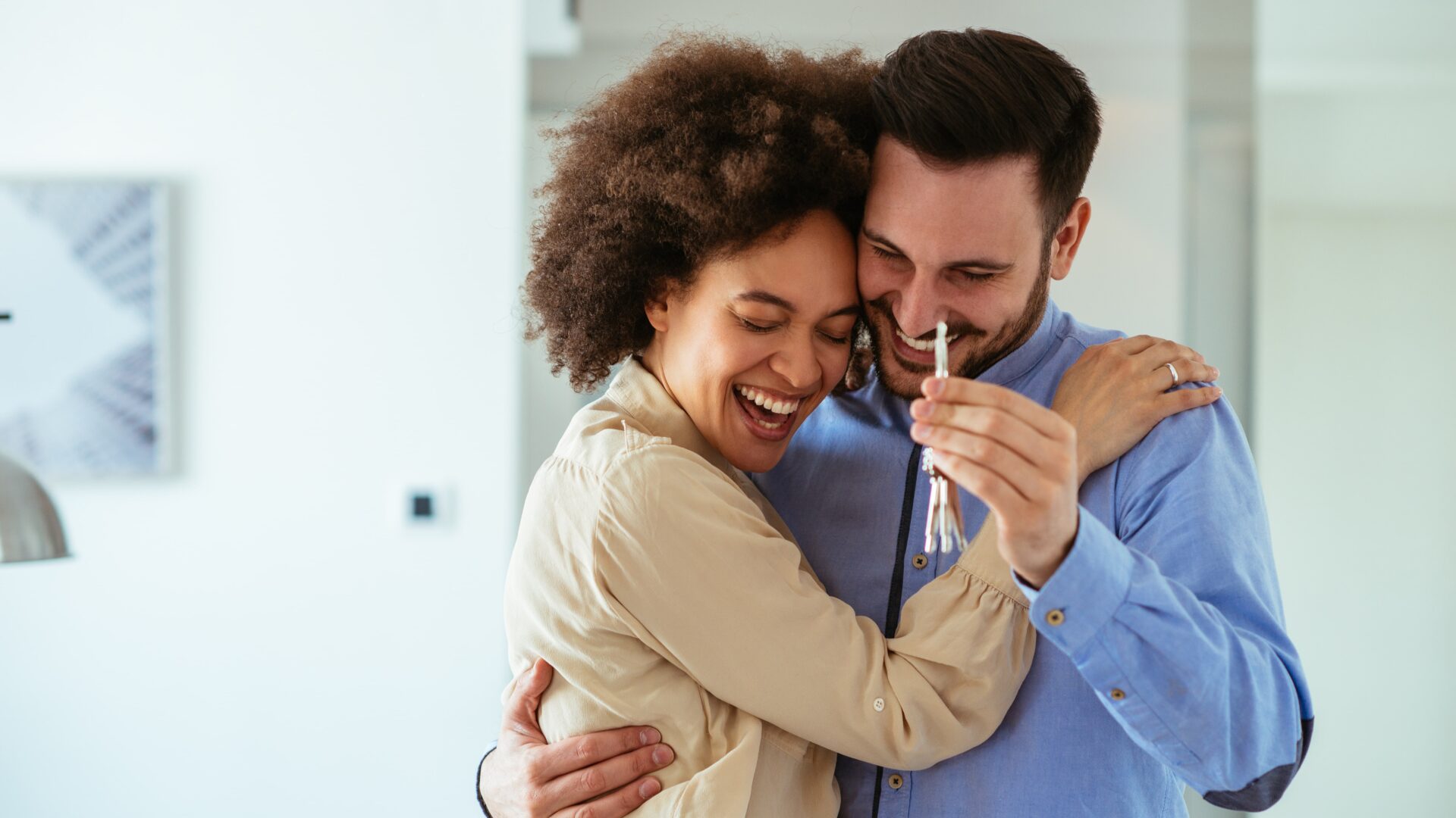 happy couple buying a home