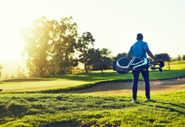 Stock photo of man on golf course