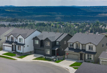 Aerial shot of three homes at the Woodridge community in Spokane