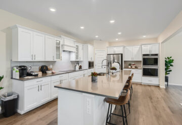 A beautiful kitchen shot with an island taken from the Magnolia floorplan at Canyon Creek