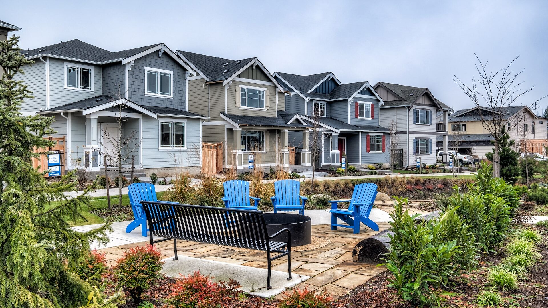 A streetscape shot of Ten Trails with a firepit amenity