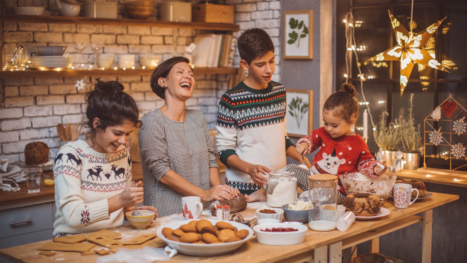 thev Holidays Christmas Family at a table