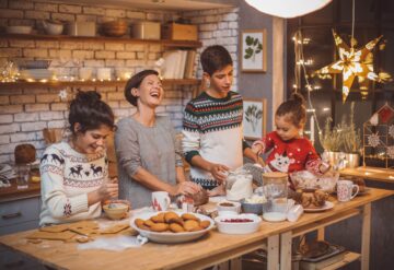 thev Holidays Christmas Family at a table