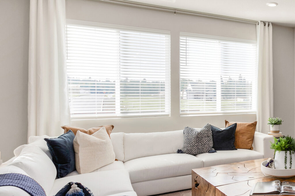 Burlington model home showcasing an open Great Room with the included blinds