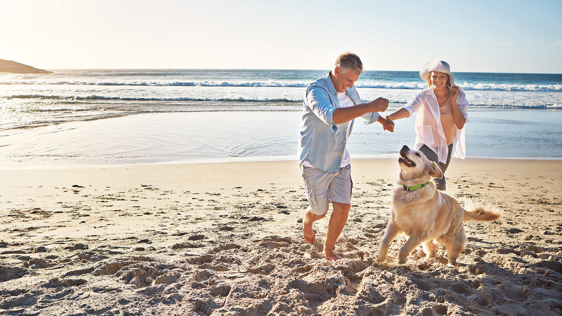 Active Adult Couple Beach