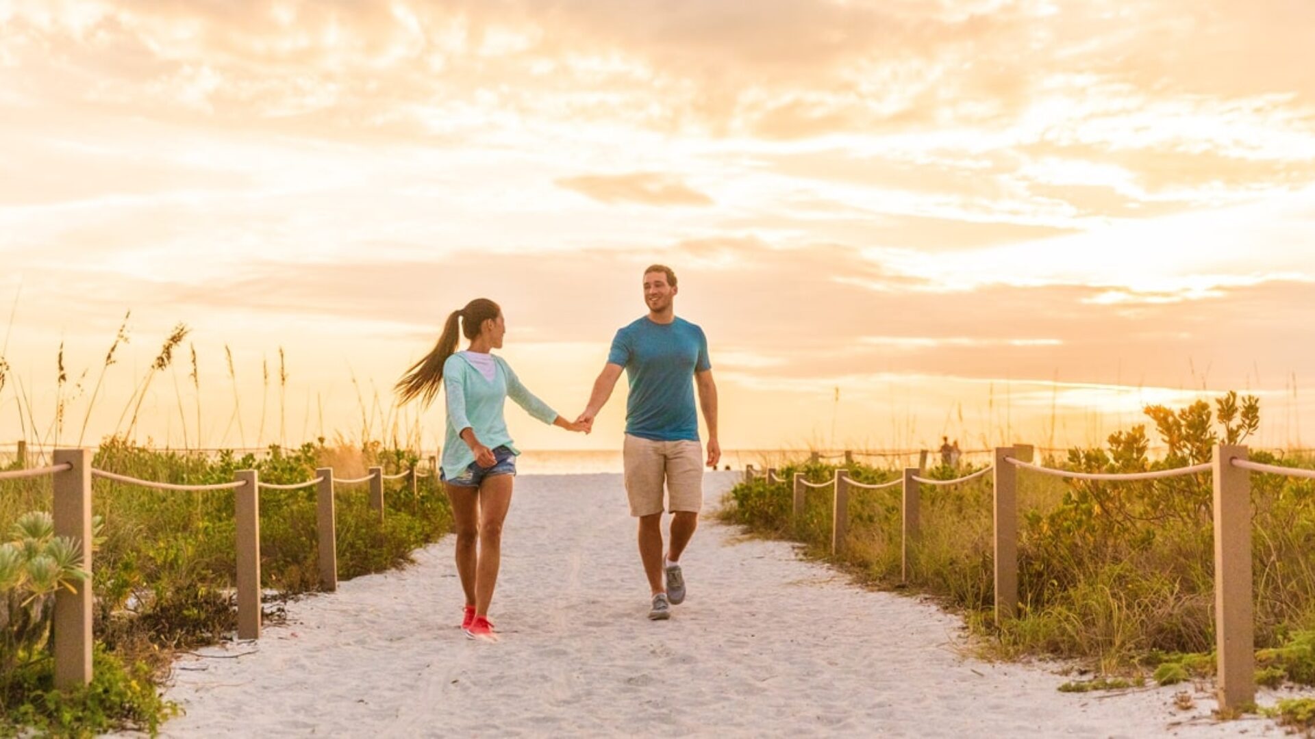 Couples Outdoors Beach Walking Holding Hands