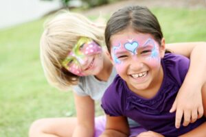 kids outdoors with face paint