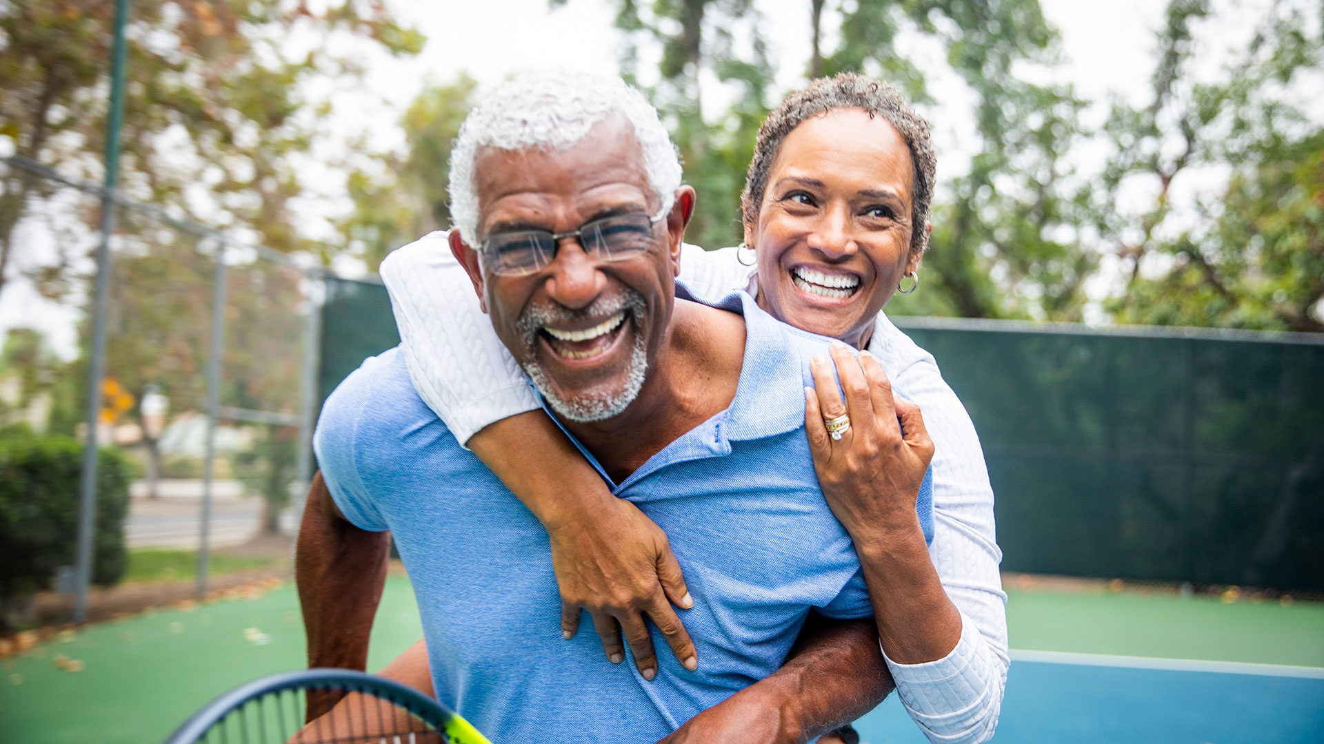 Active Adult playing tennis