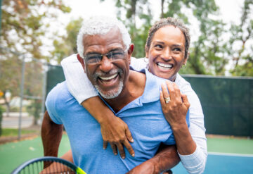 Active Adult playing tennis