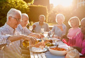 Active Adults Outdoors Dining at sunset